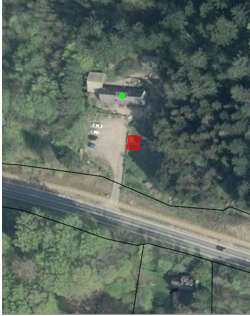 Luftfoto, hvor placeringen af madpakkehuset er markeret.