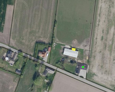 Luftfoto over ejendommen, hvor læskuret er markeret.