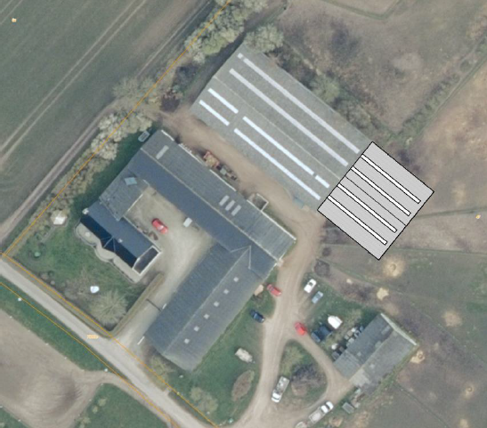 Oversigtsfoto, der viser forlængelsen af den eksisterende ridehal.